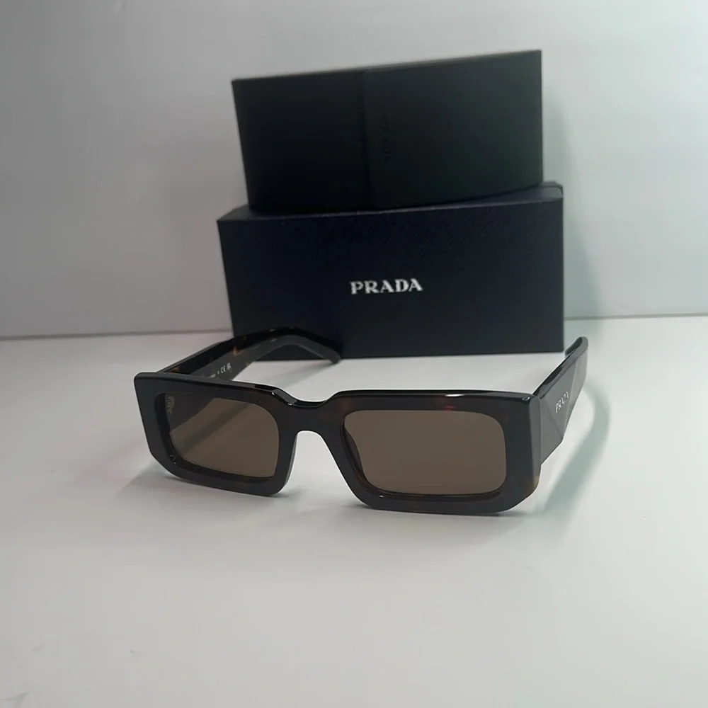 Prada PR06YS Brown Sunglasses with Bold Frames and UV Protection